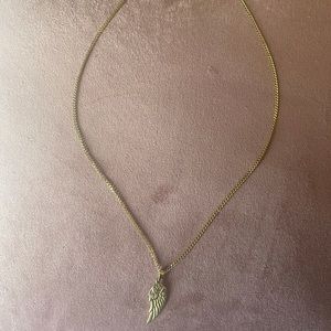 Gold color chain necklace with wing pendant